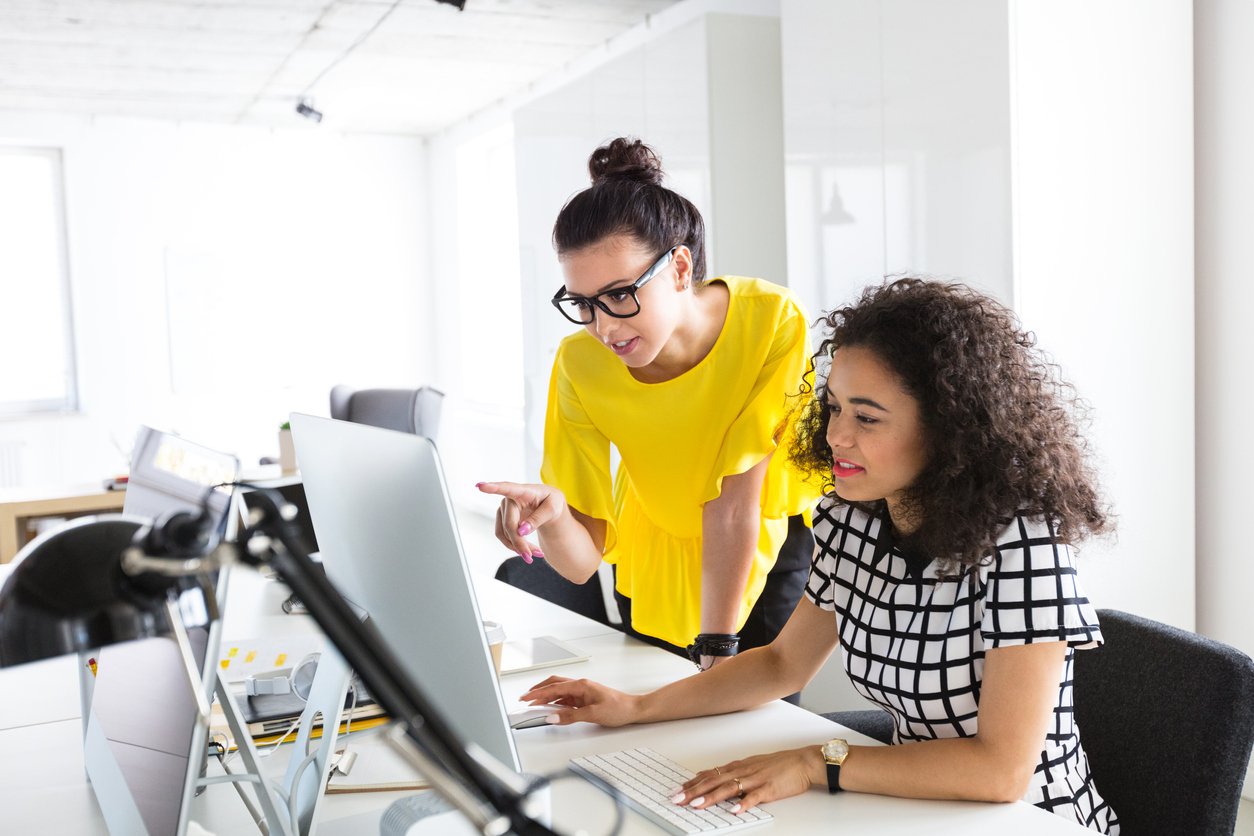 Two women working on growth driven design